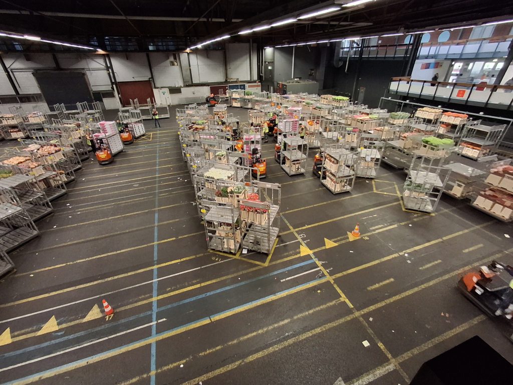 people at work at Aalsmeer Flower Auction visit